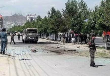Two people were killed and dozens more wounded in Kabul on Sunday as a wave of bombings hit civilian targets including a university school bus across the Afghan capital.