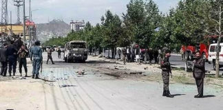 Two people were killed and dozens more wounded in Kabul on Sunday as a wave of bombings hit civilian targets including a university school bus across the Afghan capital.