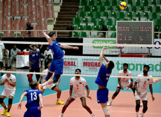 Bangladesh and Kazakhstan players engage in an intense battle at the net during their CAVA Men’s Volleyball Championship 2026 clash at the Liaquat Gymnasium, Pakistan Sports Complex.