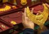 Gold prices fall by Rs1,800 per tola